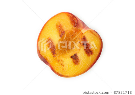 Tasty grilled peach isolated on white background Tasty grilled peach isolated on white background 87821718