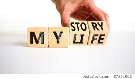 Story of my life symbol. Businessman turns wooden cubes and changes concept words My story to My life. Beautiful white table white background. Business story of my life concept. Copy space. Story of my life symbol. Businessman turns wooden cubes and changes concept words My story to My life. Beautiful white table white background. Business story of my life concept. Copy space. 87821908