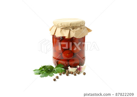 Jar of pickled tomatoes and ingredients isolated on white background Jar of pickled tomatoes and ingredients isolated on white background 87822209