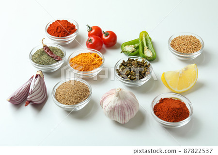 Concept of aromatic spices on white background Concept of aromatic spices on white background 87822537