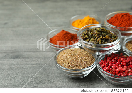 Set of different spices in glass bowls Set of different spices in glass bowls 87822553