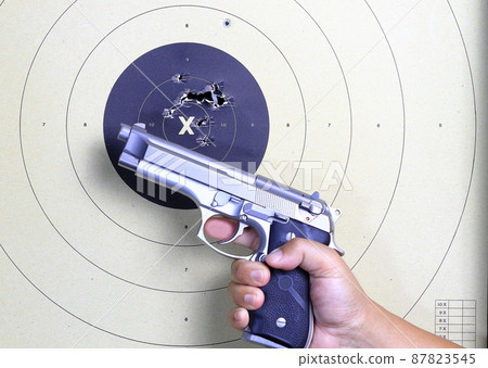 Gun and shooting target With Bullet Holes. Classic Paper Shooting Target. Holes In Target. For Sport, Hunters, Military, Police.  87823545