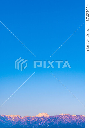 Sunrise and blue sky in the Northern Alps [Nagano Prefecture] 87825634
