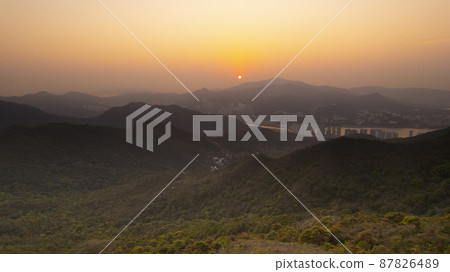 the sunset view of Wan Kok Shan, Sai Kung in Hong Kong with the townscape the sunset view of Wan Kok Shan, Sai Kung in Hong Kong with the townscape 87826489
