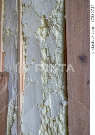 Construction site of a newly built single-family house with spray insulation 87826734