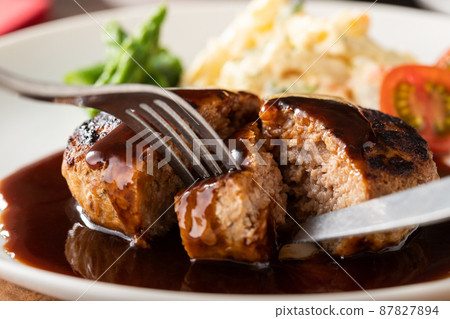 Hamburger steak with rich demiglace sauce Hamburger steak with rich demiglace sauce 87827894