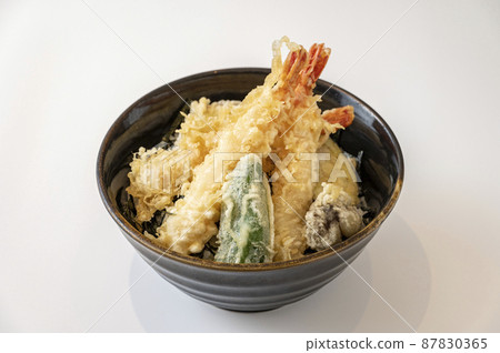 Bowl of rice and fried fish 87830365