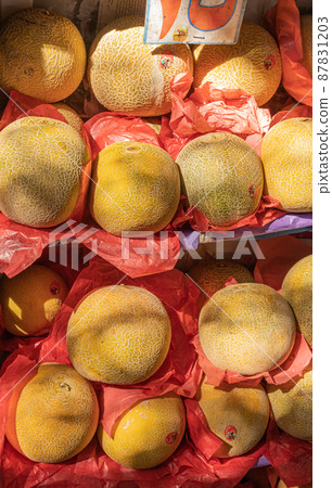 melons in local market, dramatic light melons in local market, dramatic light 87831203