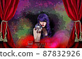 Psychic with Crystal Ball and tarot cards in Red Velvet Tent 87832926