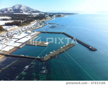 Aerial view of Kamatani fishing port in Kikonai-cho, Hokkaido in early spring Aerial view of Kamatani fishing port in Kikonai-cho, Hokkaido in early spring 87833166