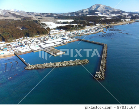 Aerial view of Kamatani fishing port in Kikonai-cho, Hokkaido in early spring Aerial view of Kamatani fishing port in Kikonai-cho, Hokkaido in early spring 87833167