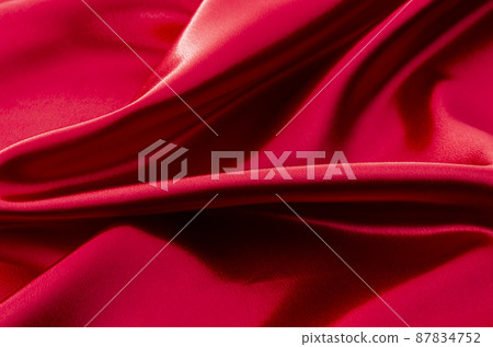 Red satin background material 87834752