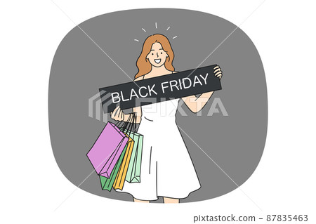 Happy girl with bags holding black Friday banner Happy girl with bags holding black Friday banner 87835463