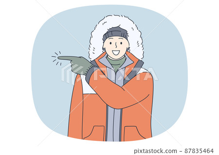 Smiling man in outerwear point direction  87835464