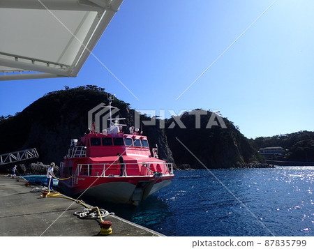 High-speed jet ship Seven Island moored at the pier of Shikinejima 87835799