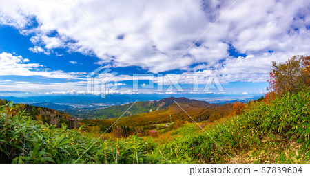 Overlooking the autumn mountains and cityscape from the hillside (Zao Onsen Ski Resort, Yamagata Prefecture) Overlooking the autumn mountains and cityscape from the hillside (Zao Onsen Ski Resort, Yamagata Prefecture) 87839604