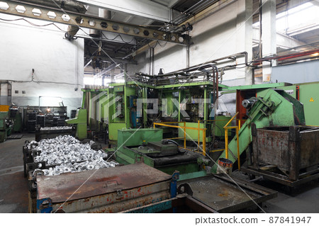 Photo shot of automobile assembly production.Car factory. Auto parts. Engine factory. Plant concept Photo shot of automobile assembly production.Car factory. Auto parts. Engine factory. Plant concept 87841947