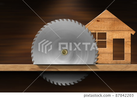 Small Wooden Model House and Metal Circular Saw Blade in Motion 87842203