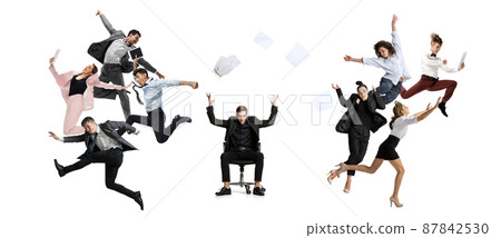 Business process. Young office workers jumping and dancing with folders, coffee, tablet on white background. Ballet dancers. Creative collage. 87842530