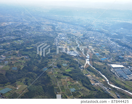 Aerial view of Karasu River and its surroundings seen from above Takasaki City (Self-Defense Forces helicopter experience boarding) 87844425