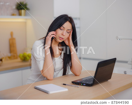 Stressed overworked business woman working from home , 87844590