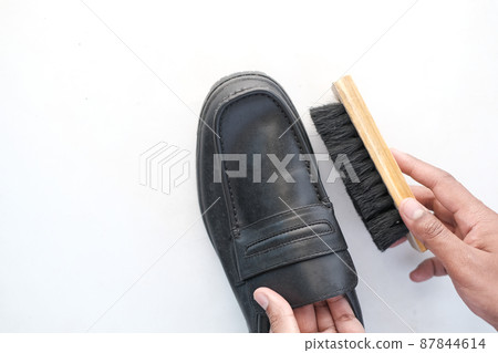 cleaning Shoe with a brush on floor cleaning Shoe with a brush on floor 87844614