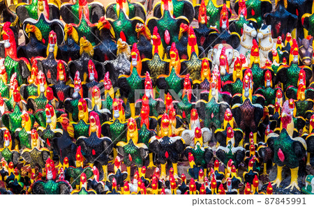 Stucco, many cocks Placed as a sacrifice in front of the place of worship Stucco, many cocks Placed as a sacrifice in front of the place of worship 87845991