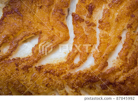 Surface texture pieces of fried white meat of fish Surface texture pieces of fried white meat of fish 87845992