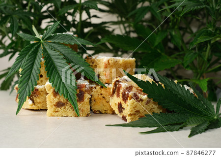 Homemade pie and powdered sugar with CBD oil. Cannabis kitchen Homemade pie and powdered sugar with CBD oil. Cannabis kitchen 87846277