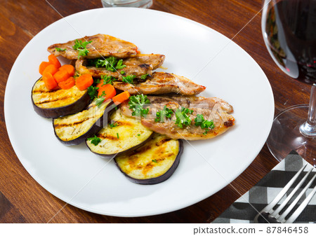 Barbecued lamb chops with aubergine Barbecued lamb chops with aubergine 87846458