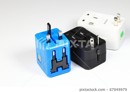 Vareity of Universal plug adapters, Box type travel plug adapters isolated on white background Vareity of Universal plug adapters, Box type travel plug adapters isolated on white background 87849979
