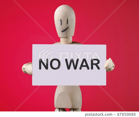 No War the inscription on the card is in the hands of a wooden man No War the inscription on the card is in the hands of a wooden man 87850088