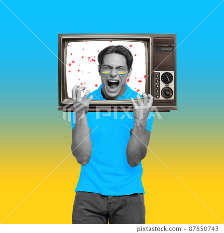 Contemporary collage. Young expressive man with TV head praying to stop the war in Ukraine isolated over blue and yellow background Contemporary collage. Young expressive man with TV head praying to stop the war in Ukraine isolated over blue and yellow background 87850743