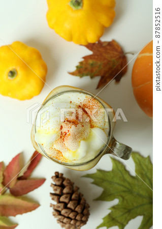Concept of pumpkin latte on white table 87852516