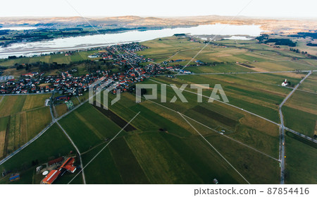 Aerial landscape of town in rural fields Aerial landscape of town in rural fields 87854416