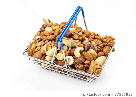Various types of nuts in the grocery cart. Marketing sale of food products 87855952