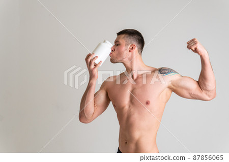 Fitness protein jars white on white background bodybuilder powder strong high body painful, backache sick male background medicine, illness Touching neck sickness, disease suffer attractive Fitness protein jars white on white background bodybuilder powder strong high body painful, backache sick male background medicine, illness Touching neck sickness, disease suffer attractive 87856065