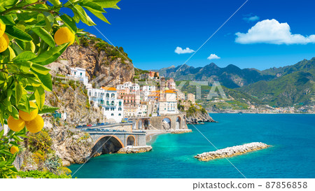 Beautiful view of Amalfi on the Mediterranean coast with lemons in the foreground, Italy Beautiful view of Amalfi on the Mediterranean coast with lemons in the foreground, Italy 87856858