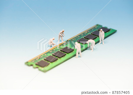 Technicians inspecting RAM memory module. Macro photo 87857405