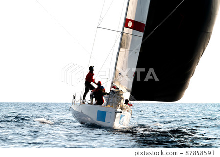 People silhouette on a sailing boat People silhouette on a sailing boat 87858591