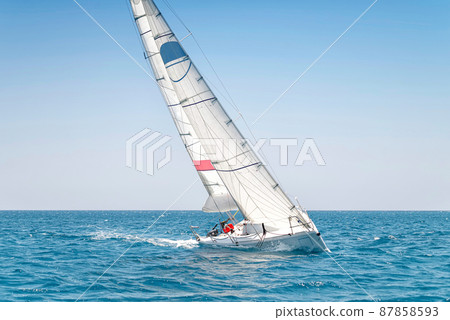 Sailing keelboat yacht with white sails Sailing keelboat yacht with white sails 87858593