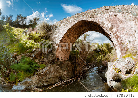 Medieval venetian stone bridge in Akapnou. Limassol District, Cyprus Medieval venetian stone bridge in Akapnou. Limassol District, Cyprus 87859415