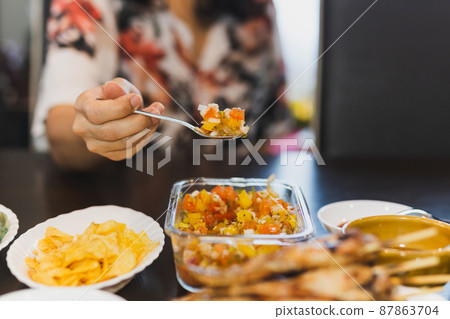 Homemade tomato sauce salsa dip with nachos on table. Homemade tomato sauce salsa dip with nachos on table. 87863704