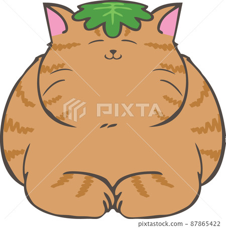Tea tabby cat with Kashiwa mochi leaves on its head 87865422