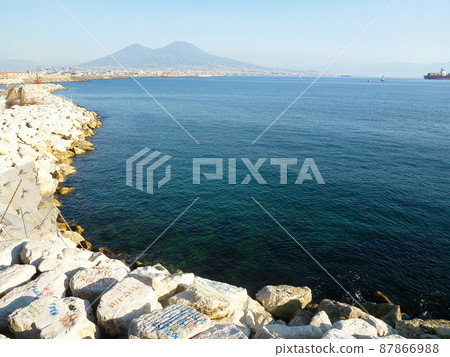 Coastline and mountains in the distance in Naples, Italy 87866988