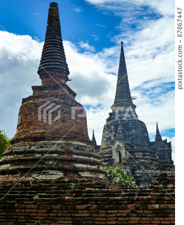 Stupas lined up at the Ayutthaya archaeological site near Bangkok, Thailand Stupas lined up at the Ayutthaya archaeological site near Bangkok, Thailand 87867447