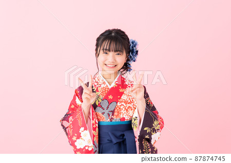 Elementary school girl wearing a hakama Elementary school girl wearing a hakama 87874745