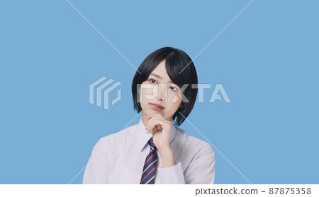 Thinking female high school girl 87875358