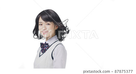 Female student with fluttering hair, high school student, examinee 87875377