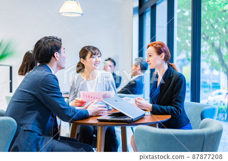 Staff having a meeting in the office 87877208